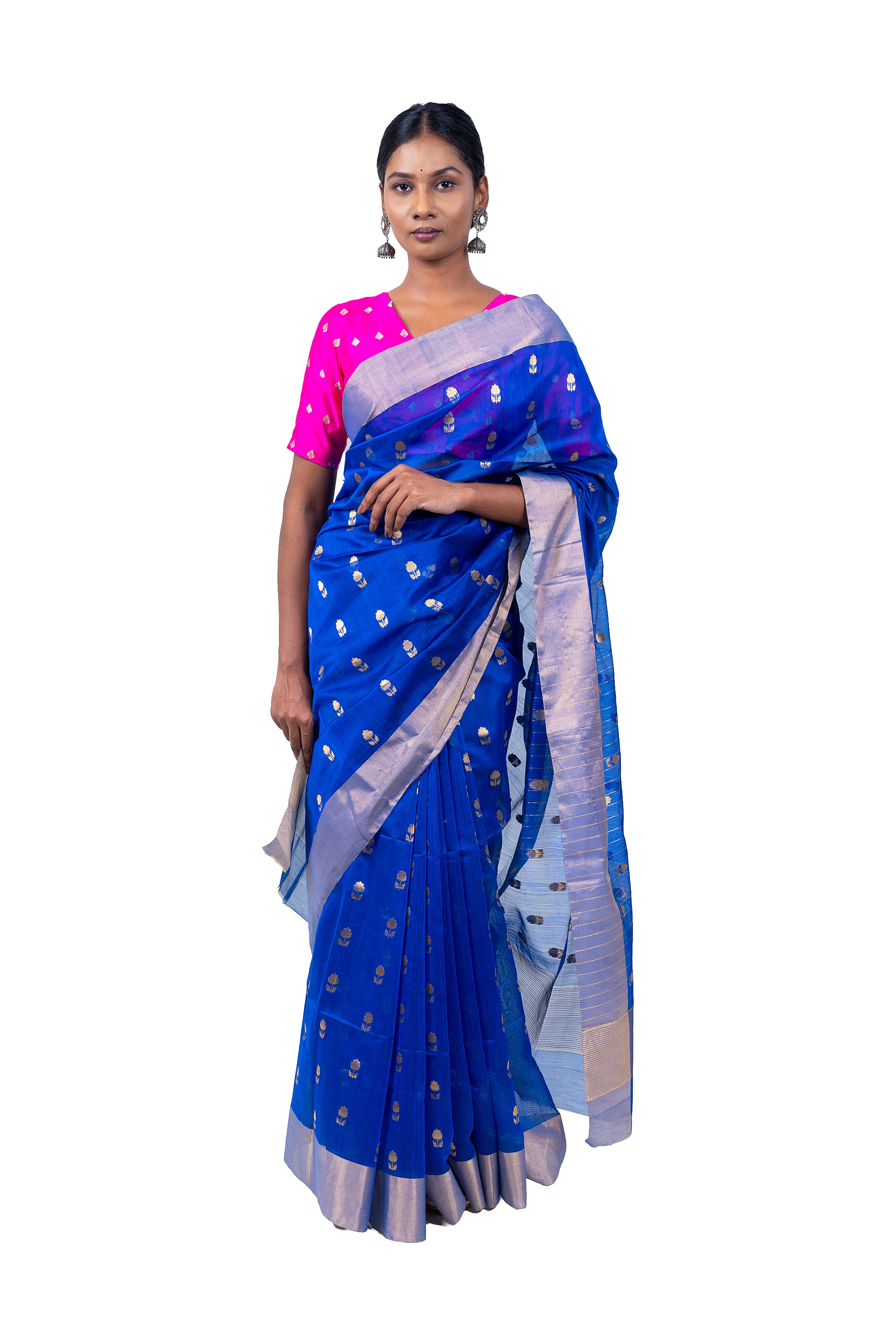 Woman wearing a blue saree with a pink blouse on a white background