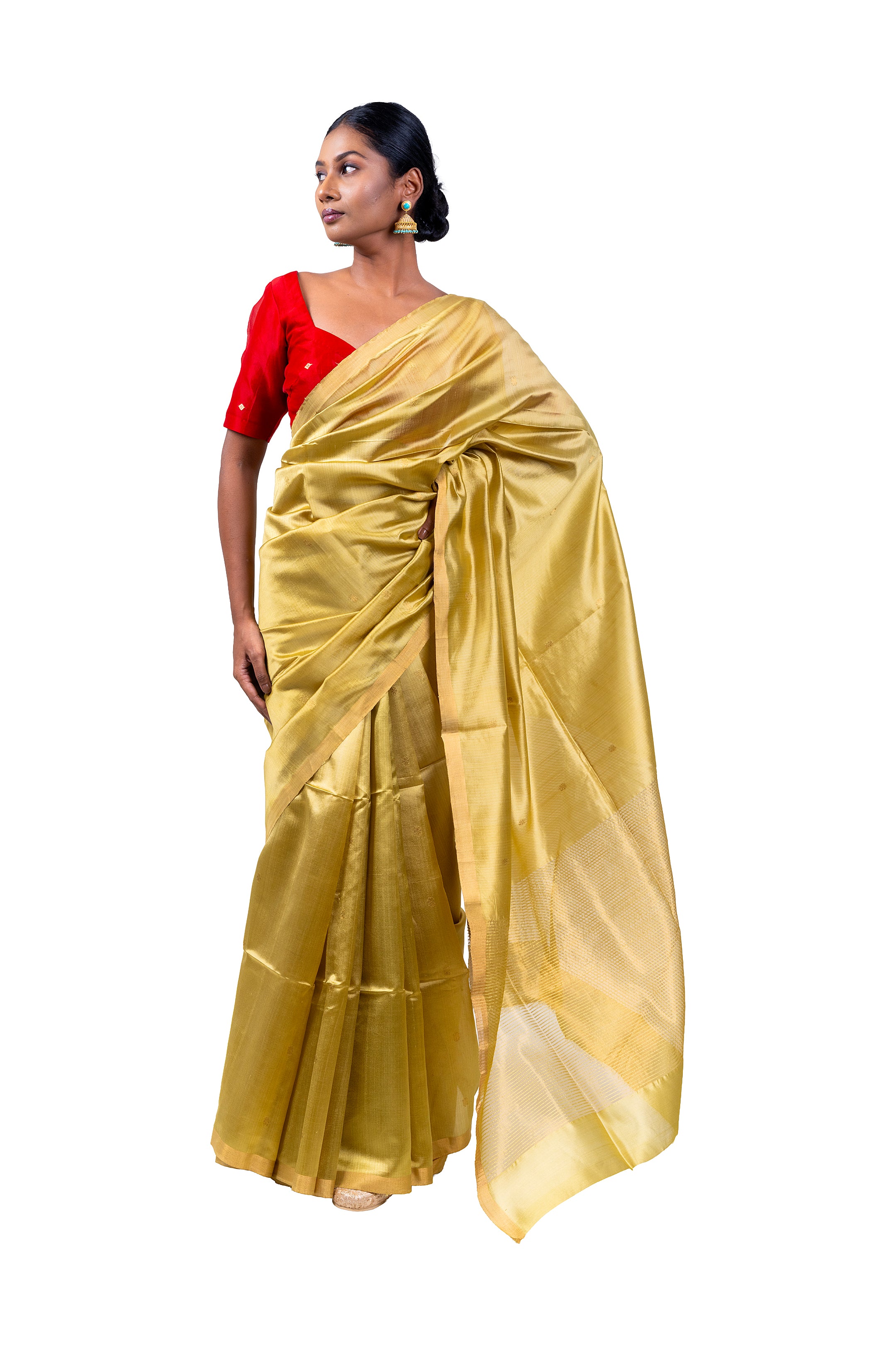 Woman wearing a gold saree with a red blouse on a white background