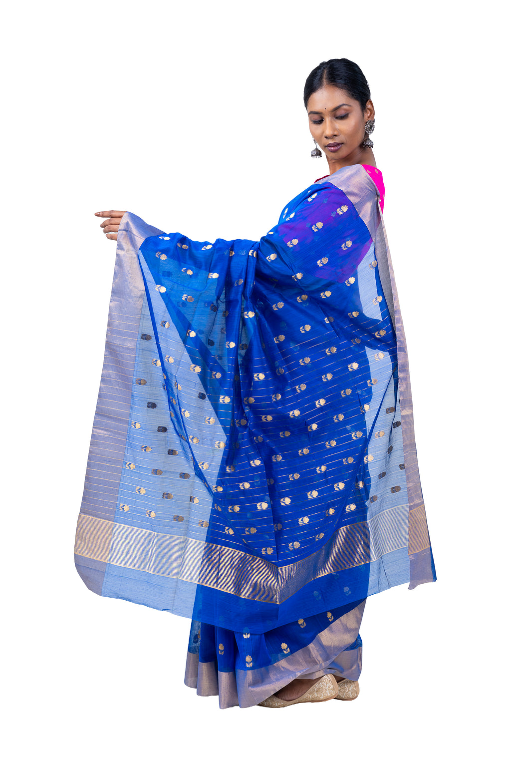 Woman holding a blue and white saree with a white background