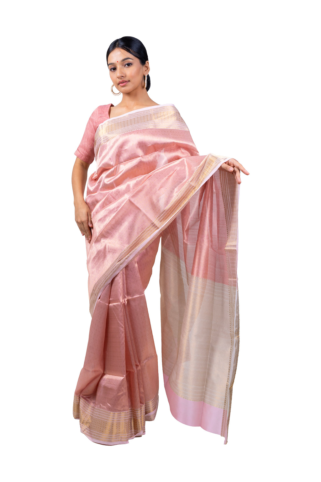 Woman wearing a pink saree with a white background