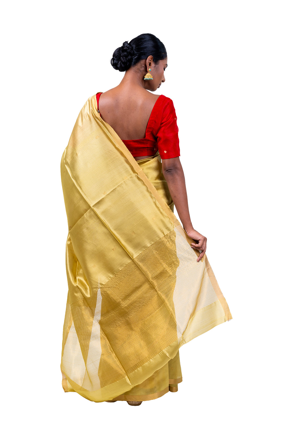 Woman wearing a yellow saree with a red blouse on a white background