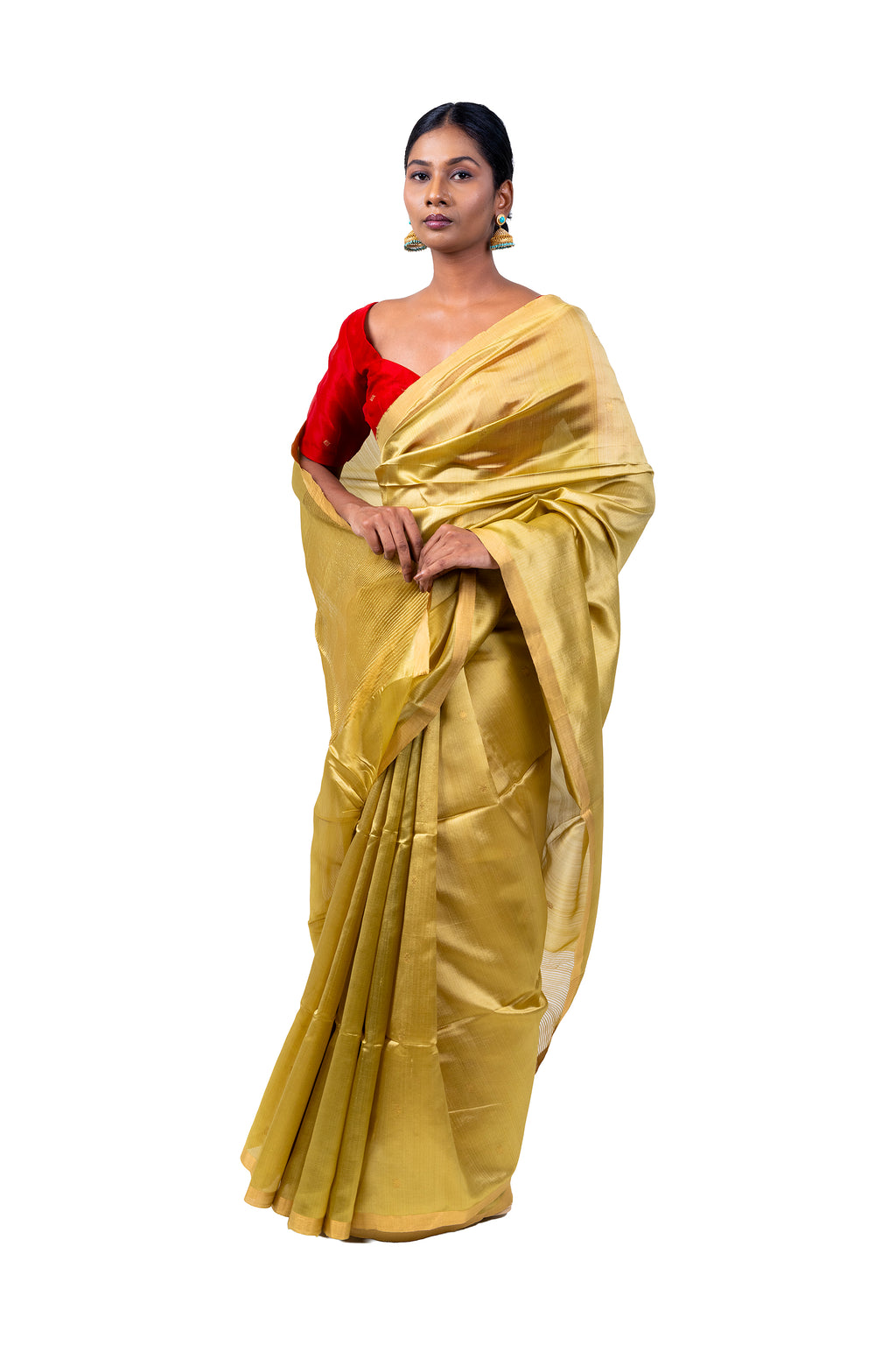 Woman wearing a gold saree with a red blouse on a white background