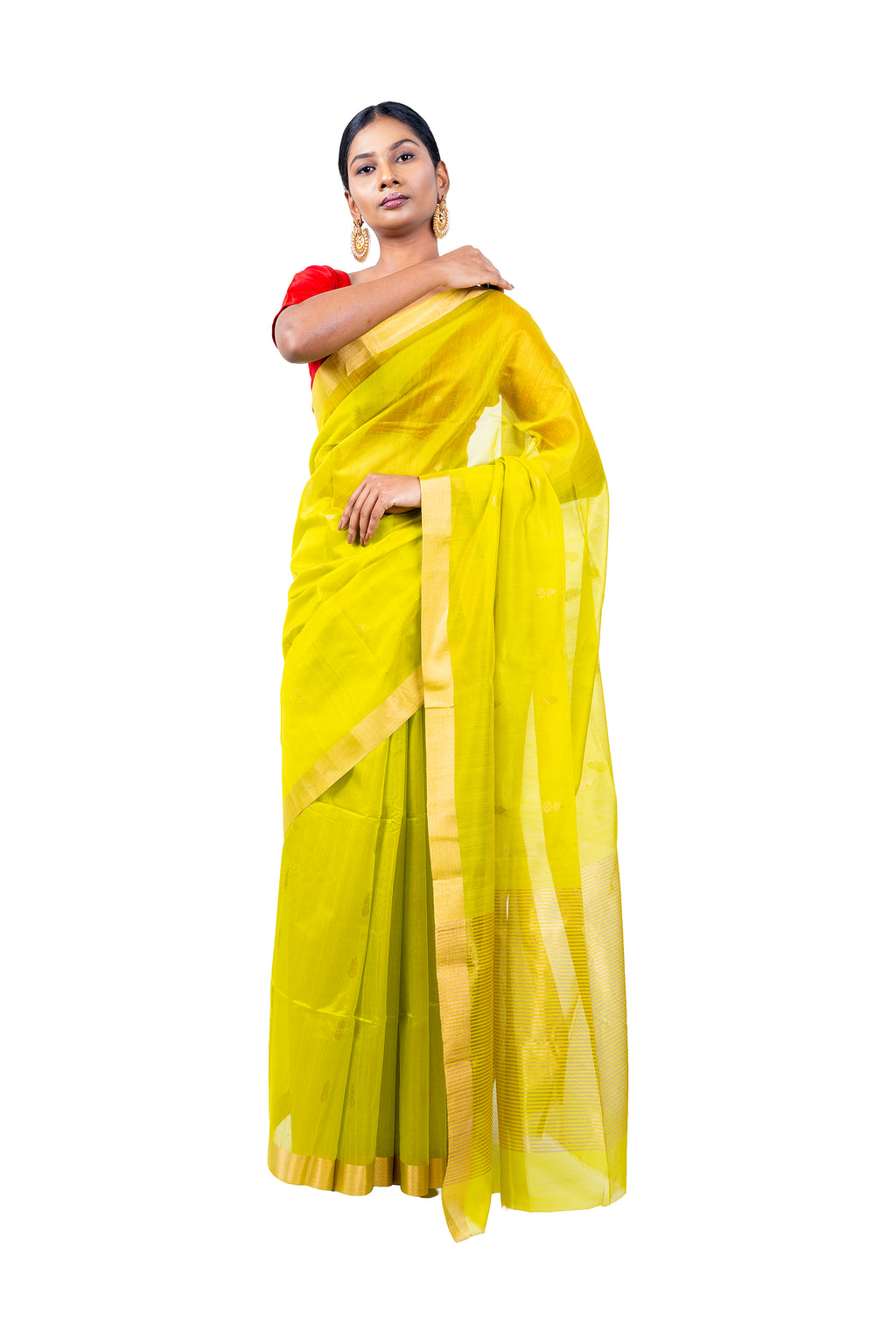 Woman wearing a yellow saree with a white background