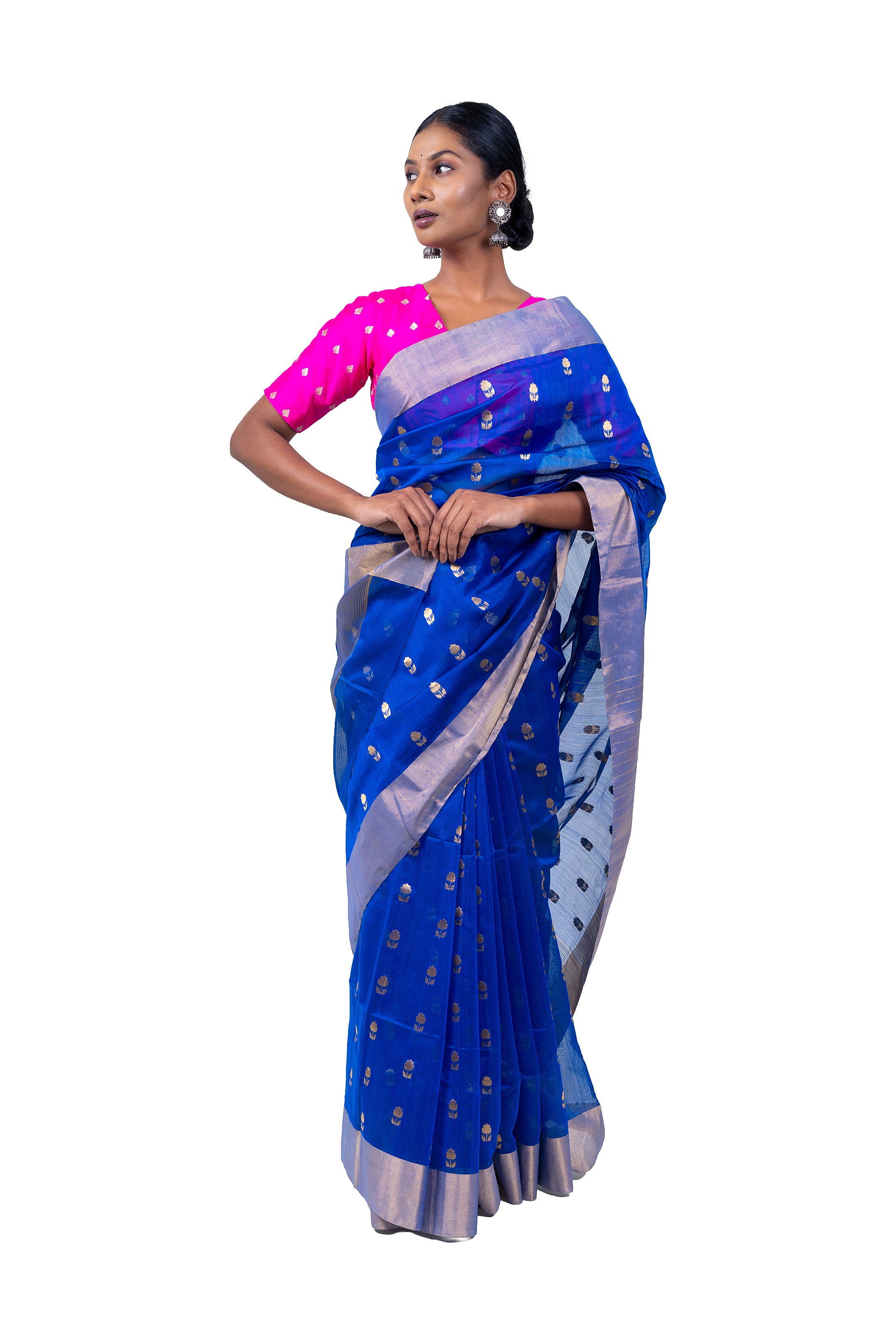Woman wearing a blue saree with a pink blouse on a white background