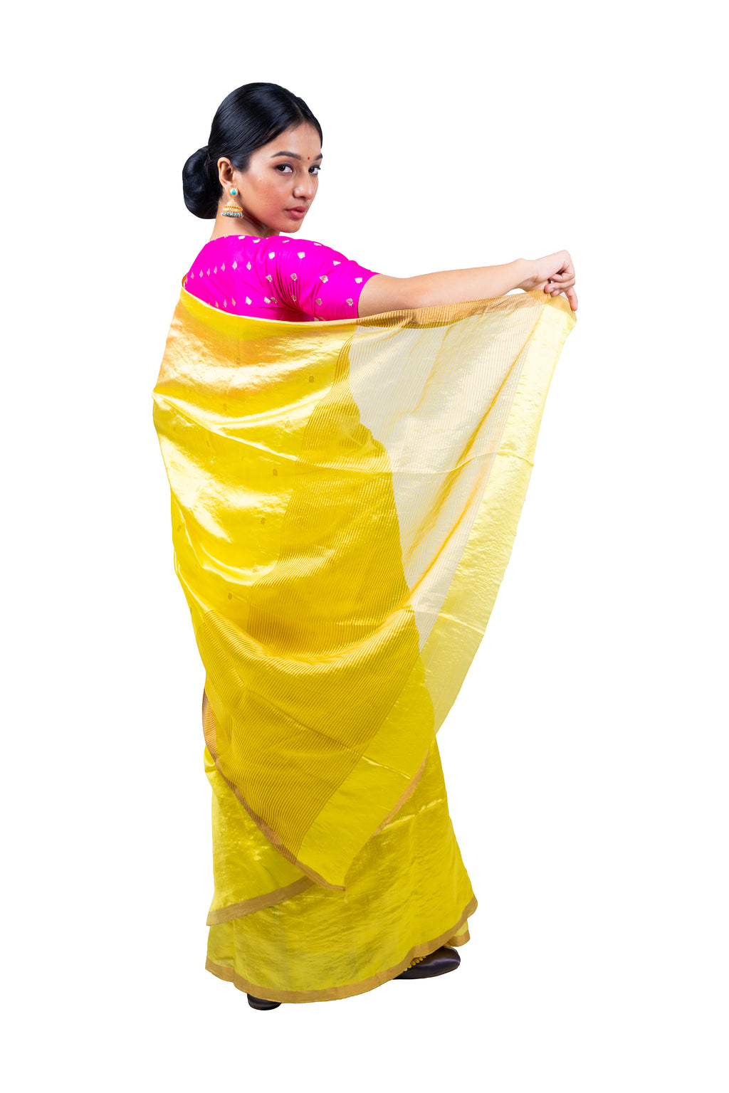 Woman wearing a yellow saree with a pink blouse on a white background